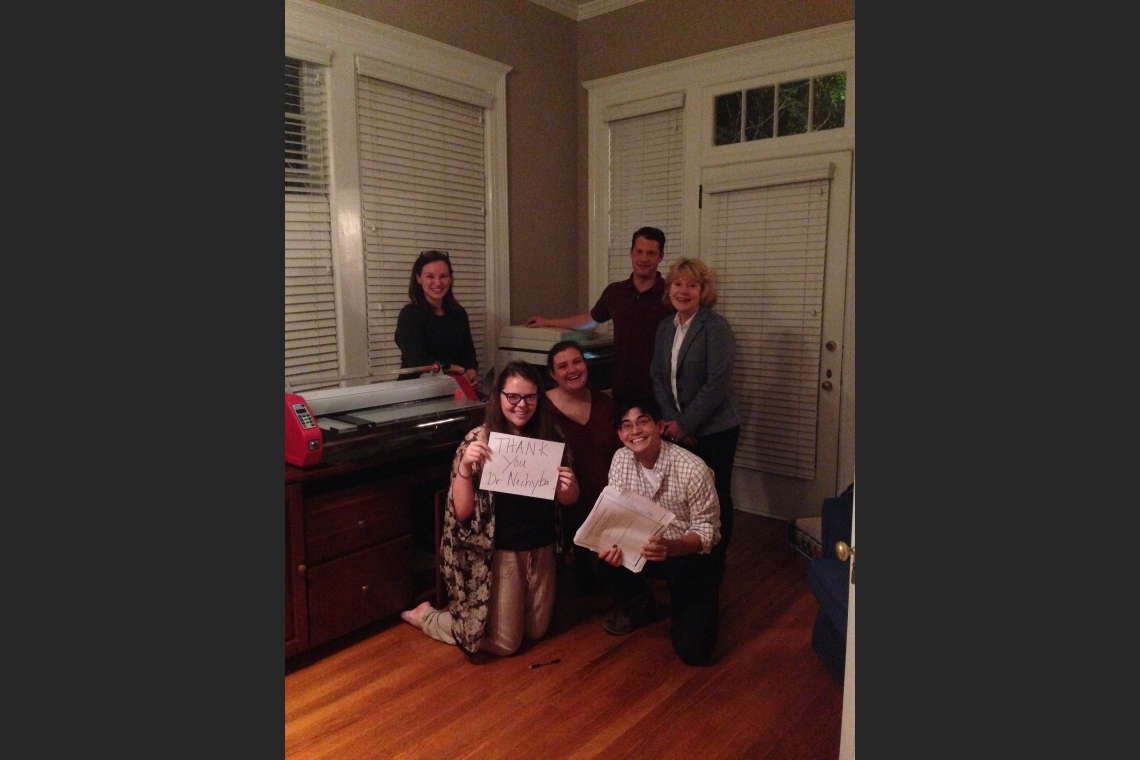TeachHouse fellows celebrate Dr. Nechyba's incredible gift of an at-home copier!